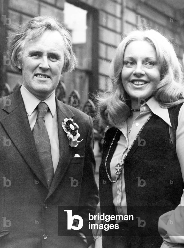 SNP Party chairman and Edinburgh North candidate William Wolfe with Margo MacDonald, Govan candidate, seen here giving an interview to the press following a break - in at the Party's Edinburgh headquarters. 23rd October 1973 (b/w photo)