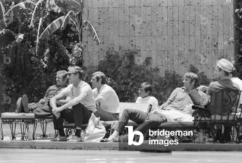 1970 World Cup Finals in Mexico. England players relaxing by the side of the swimming pool at their hotel, 6th June 1970 (b/w photo)