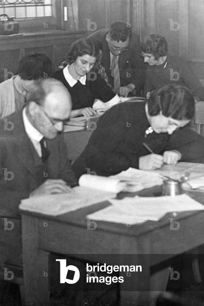 Teachers in Jarrow join the war effort by helping the preparation of ration cards. October 1939.