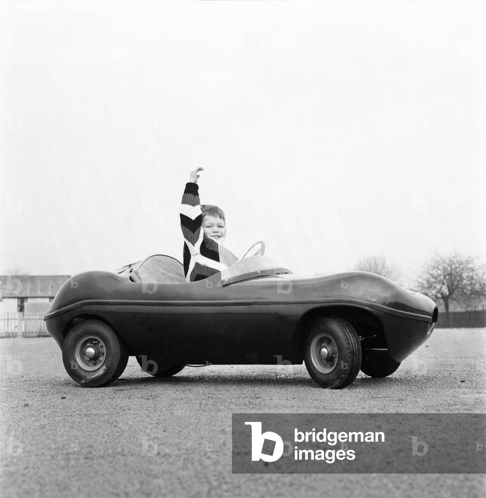 Young drivers: Small boys driving miniature cars, January 1966 (b/w photo)