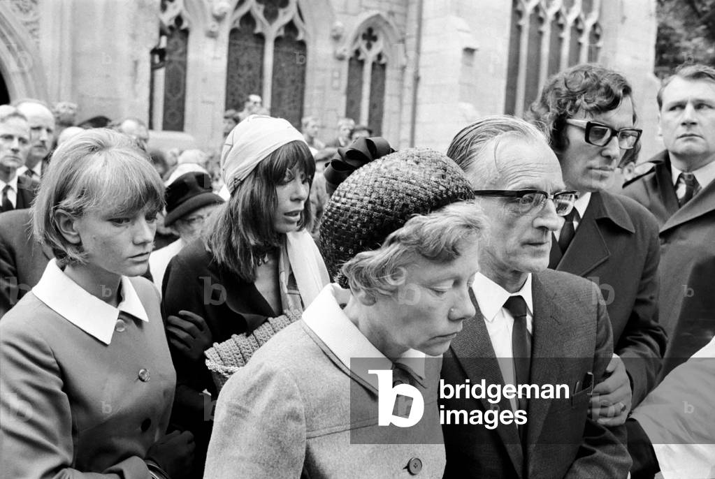 Rolling Stones: Brian Jones funeral. L to R Brian Joness sister, Brian Jones girlfriend, model Suki Potier, Mrs. Jones, Mr. Jones, (Brian's parents) and the Stones 'gofer' Tom Keylock 10 July 1969