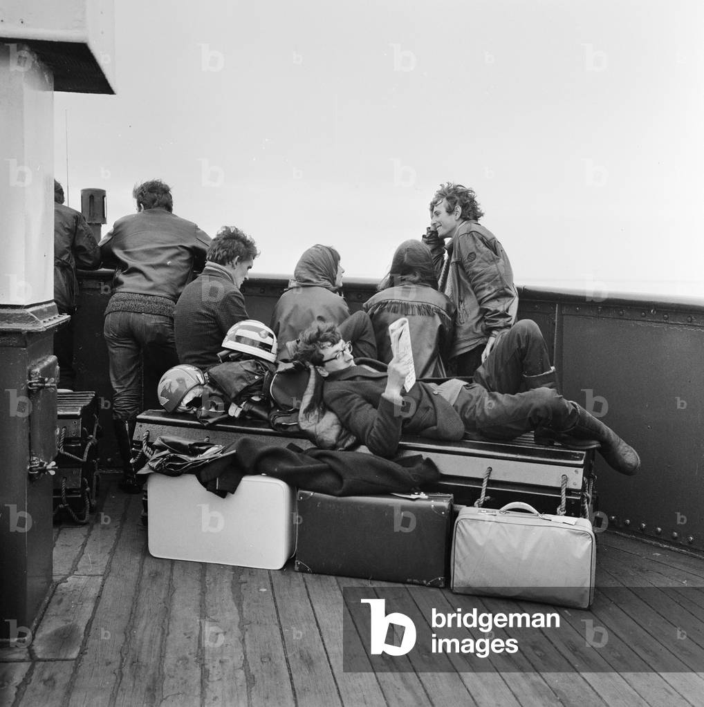 TT race fans on the ferry over to the Isle of Man. 29th June 1965 (b/w photo)