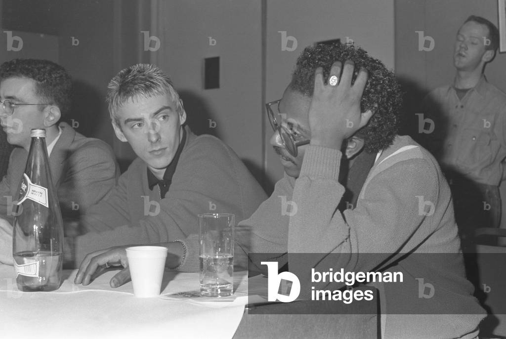 A press reception was held at the Odeon Cinema in Birmingham before the Red Wedge Tour took to the stage with their musical show full of political propaganda aimed at getting the Labour Party back into power at Westminster. Paul Weller and Junior Giscombe. 27th January 1986 (b/w photo)