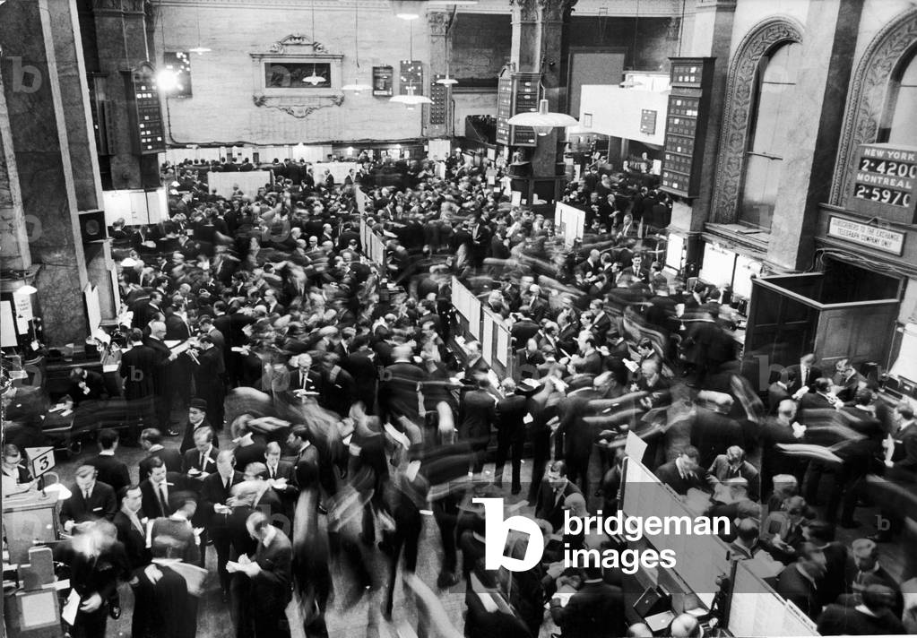 Busy scenes showing crowds of traders in a hurry at the London Stock Exchange shorlty after opening for business, 
21st November 1967.