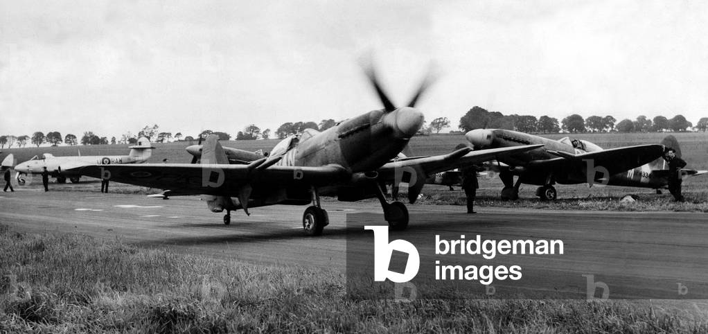 Supermarine Spitfire F22's, of 607 County of Durham Squadron, taxi for take off at the RAF station at Ouston. The squadron was taking part in the commemoration of the 9th anniversary of the 'Battle of Britain'. 17/09/1949 (b/w photo)