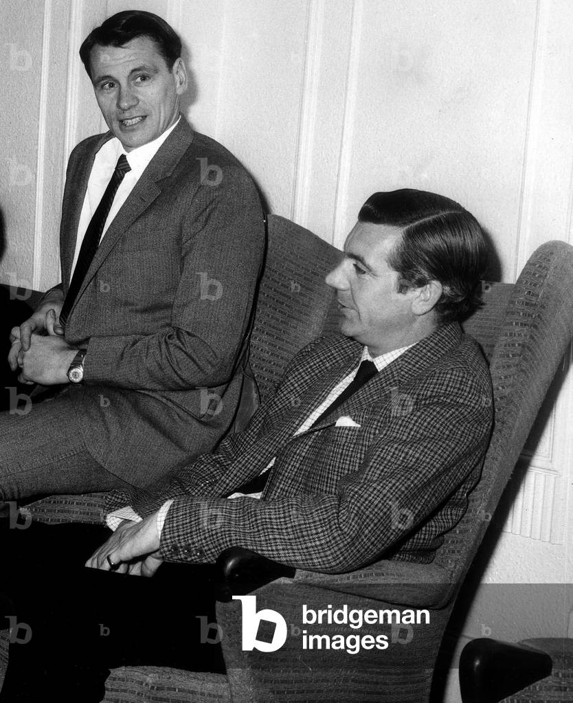 New Fulham manager Bobby Robson (l) speaking with senior player Johnny Haynes at Craven Cottage January 1968 (photo)