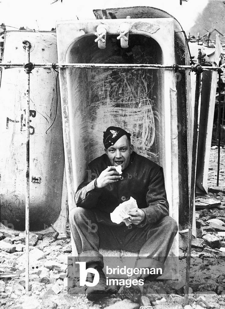 Soldiers WW2 sheltering in a bath in Hyde Park, c. 1940 (b/w photo)
