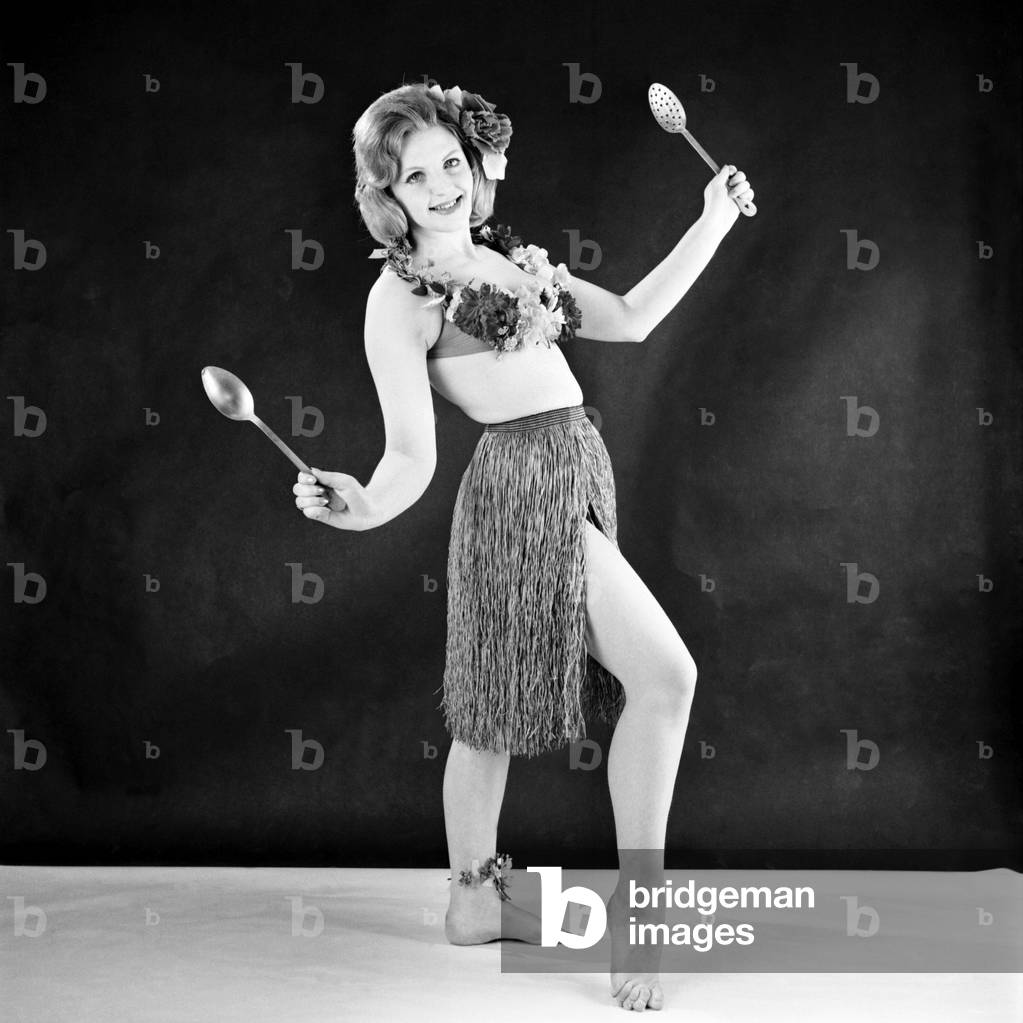 Hula girl costume modelled by Peggy Cage, August 1959 (b/w photo)