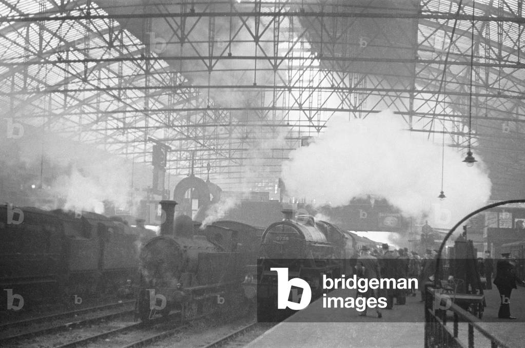 Locomotives and trains of the London Midland Service seen here at Birmingham New Street Station circa 1939