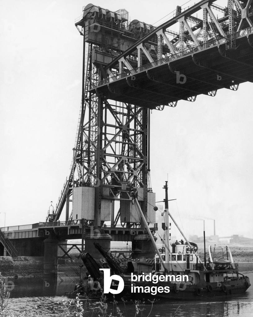 The dredger Wilton seen here passing under the Newport lifting bridge. 9th July 1971 (b/w photo)