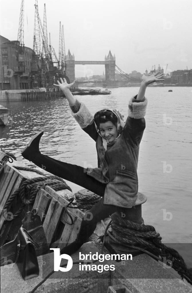 Millicent Martin by the Thames during filming of 'Nothing but the best'. 2nd May 1963 (b/w photo)