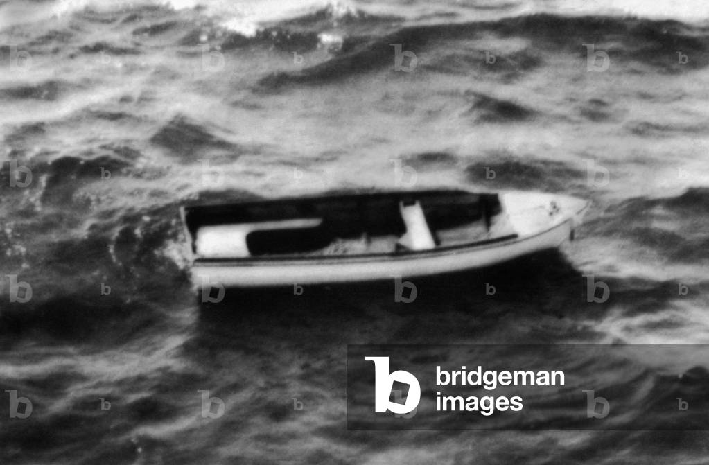 An empty boat drifiting on the sea, the only trace found in a massive search for the motor cruiser Darlwyne which went missing on a pleasure cruise along the Cornish coast with 31 people on board. The 45 foot long boat sailed from Mylor near Falmouth and was last seen of Fowey heading home. 1st August 1966 (b/w photo)