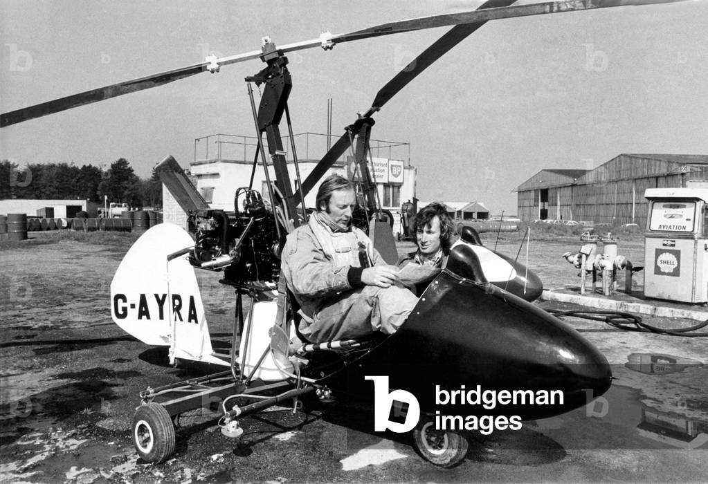 Two auto gyros left Ashford Airport at noon to cross channel en route for Paris Air Show. The pilots are Jeremy Metcalfe (Light Overalls) and Monny Curzon (Dark Overalls) of Campbell Aircraft, Memberry Airfield Newbury. May 1971