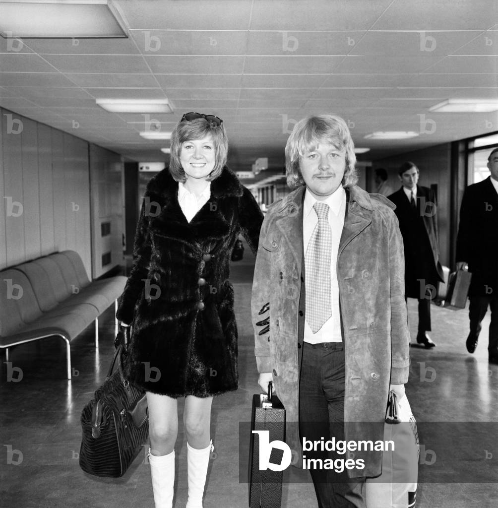 Singer Cilla Black pictured at Heathrow airport with her husband Bobby. . February 1970