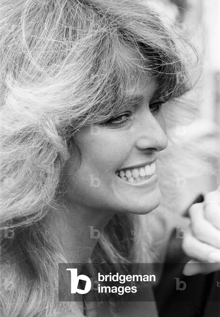 US actress Farrah Fawcett Majors pictured at a photo reception at the Dorchester Hotel in London April 1978 (b/w photo)