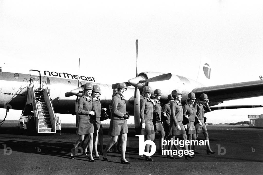 11 air stewardesses who earned their wings after passing the Northeast Airlines air hostess course at Newcastle Airport Training Centre, 13th February 1971 (b/w photo)