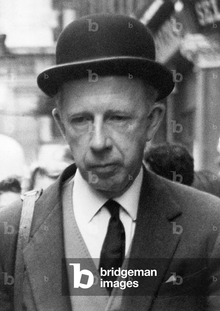 Dr. Keith Simpson arriving at the scene of a crime in Brewer Street, Soho, 7th October 1963 (b/w photo)