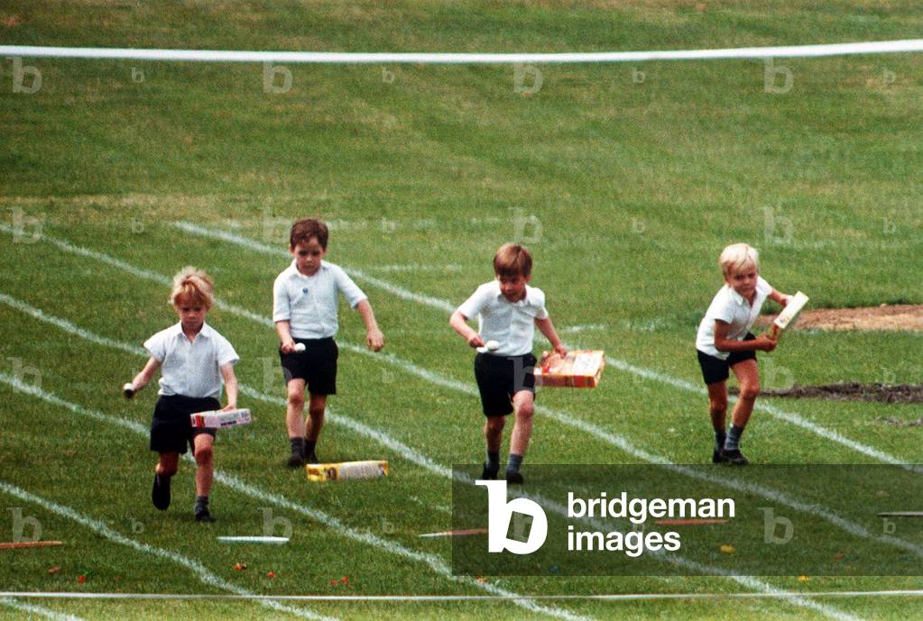 Prince William at his school sports day at Richmond Sports Stadium taking part in an egg and spoon race, 1988 (photo)