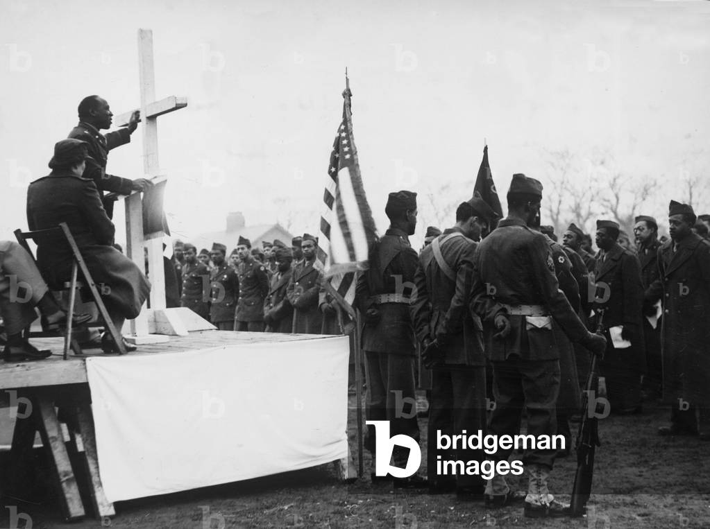 A Sunrise service held on the baseball ground of a US army camp near Liverpool on easter Sunday for black American troops during the Second World War, 11th April 1944 (b/w photo)