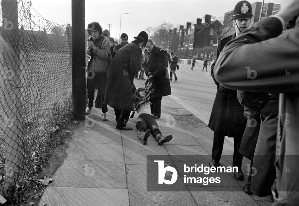 Police arrest protesting students in Talbot Road behind White City, who have gathered in a demonstration against the visit of the South African rugby team and the apartheid system. November 1969