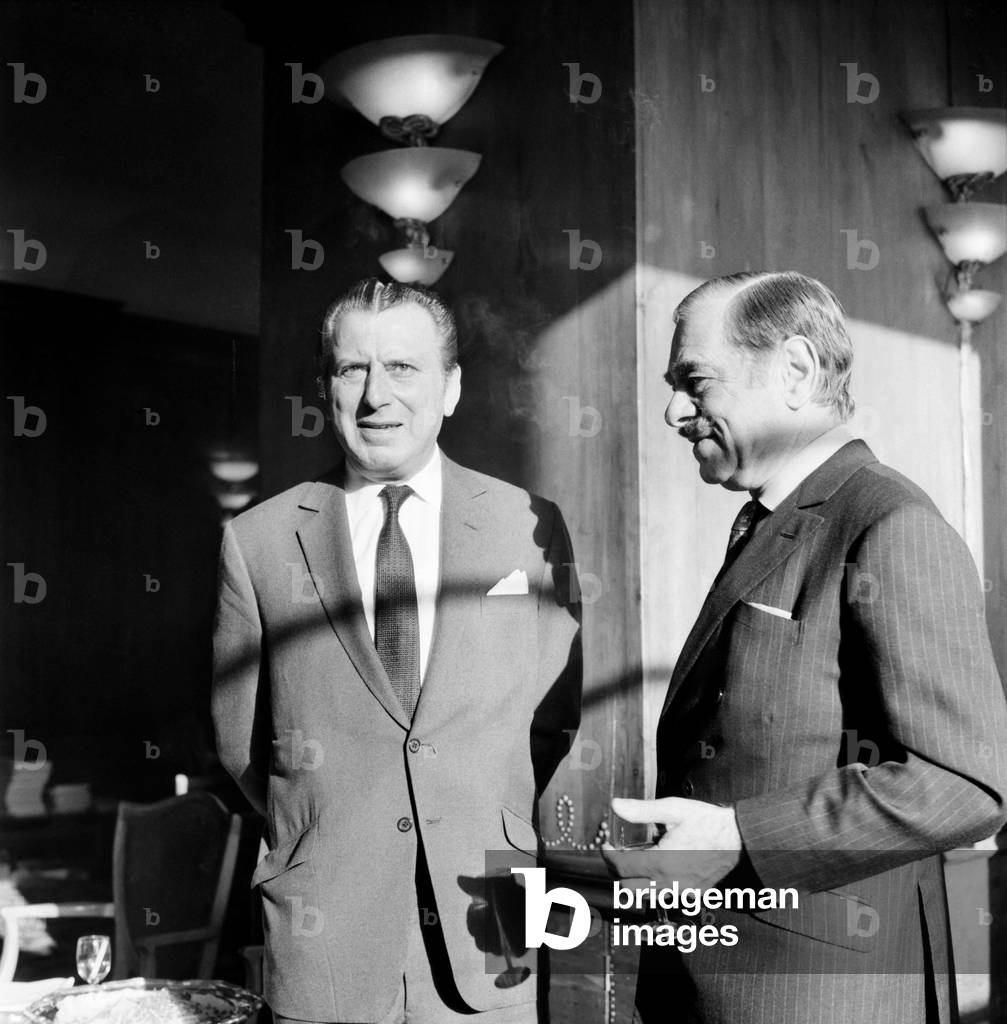 A press reception was held at the Savoy Hotel, with the announcement of Anglo Amalgamated's new programme (about £15 million), Bernard Delfont, chairman and chief executive of associated British picture corporation, has now completed arrangements for the corporation to produce 28 new films all to mature within the next 18 months. the new Anglo Amalgamted programme is under the personal supervision of Nat Cohen, chairman of Anglo who was also at the reception. (left to right) Bernard Delfont with Nat Cohen. November 1969