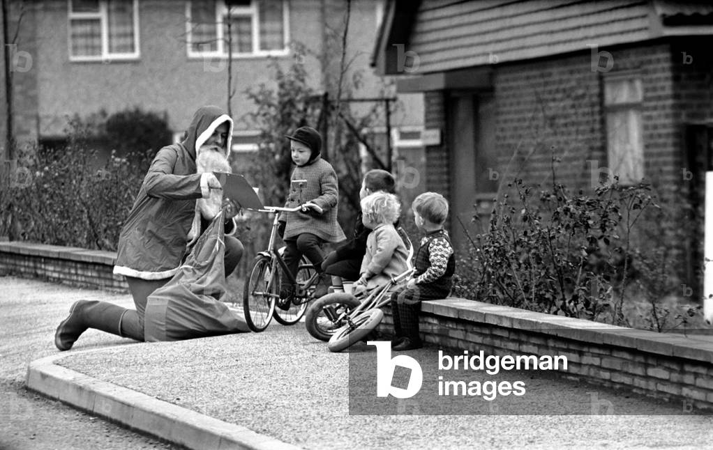 Geoffrey Lever of Basford, Nottinghamshire, who takes on the role of Father Christmas and hands out toys to children on his beat. 
December 1969