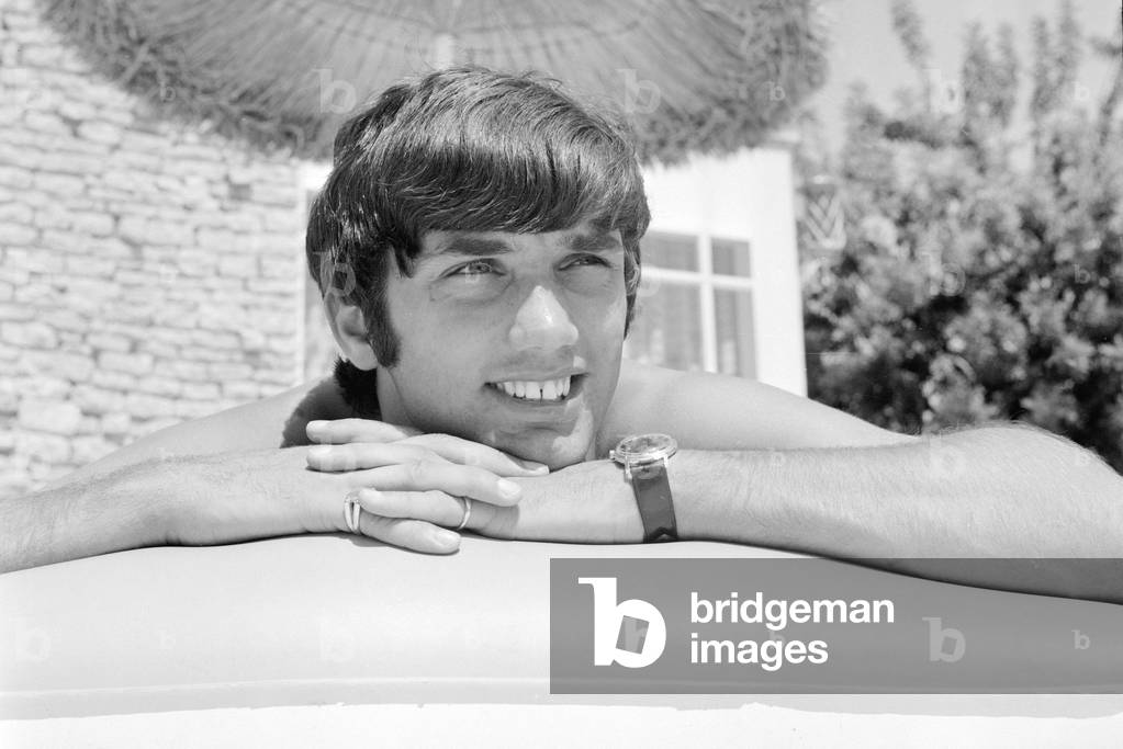 George Best relaxing on an inflatable bed whilst on holiday April 1967 (photo)
