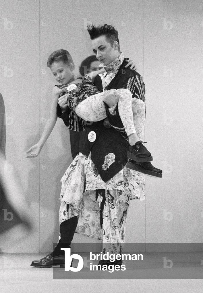 Culture Club singer Boy George modelling clothes, 1985