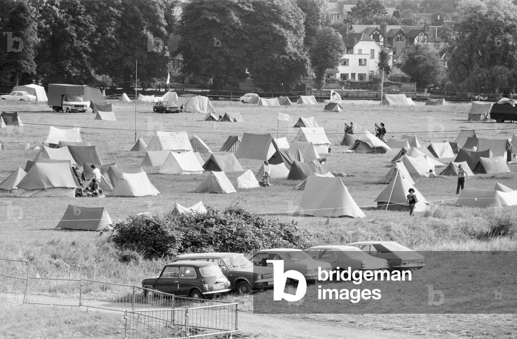 Campsite grows as festival goers start to arrive for the 20th National Rock Festival, taking place 22nd to 24th August, at Richfield Avenue, Reading, August 1980.