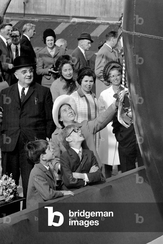 The 29,000 ton bulk carrier Star Acadia was launched at Cammell Lairds shipbuilding yard in Birkenhead. Mrs. Haley about to break the bottle on the bows as her sons looks up at the tower in ship above them. 
September 1969