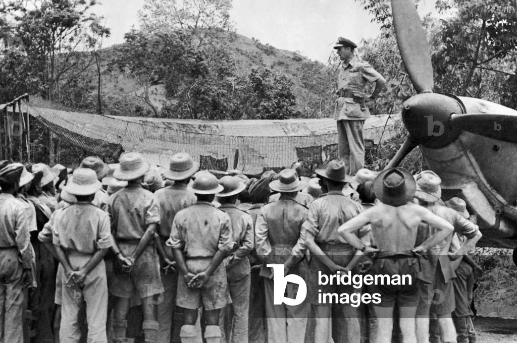 Vice Admiral Lord Louis Mountbatten, Supreme Allied Commander of South East Asia, speaking to officers and men of the 1st Squadron of the Indian Air Force at Imphal, June 1944 (b/w photo)