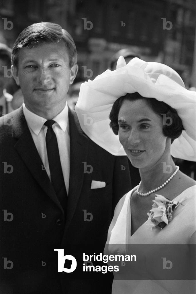 Australian cricket test captain Richie Benaud pictured with his new bride, formerly Daphne Surfleet, after their wedding in London,. 26th July 1967 (b/w photo)