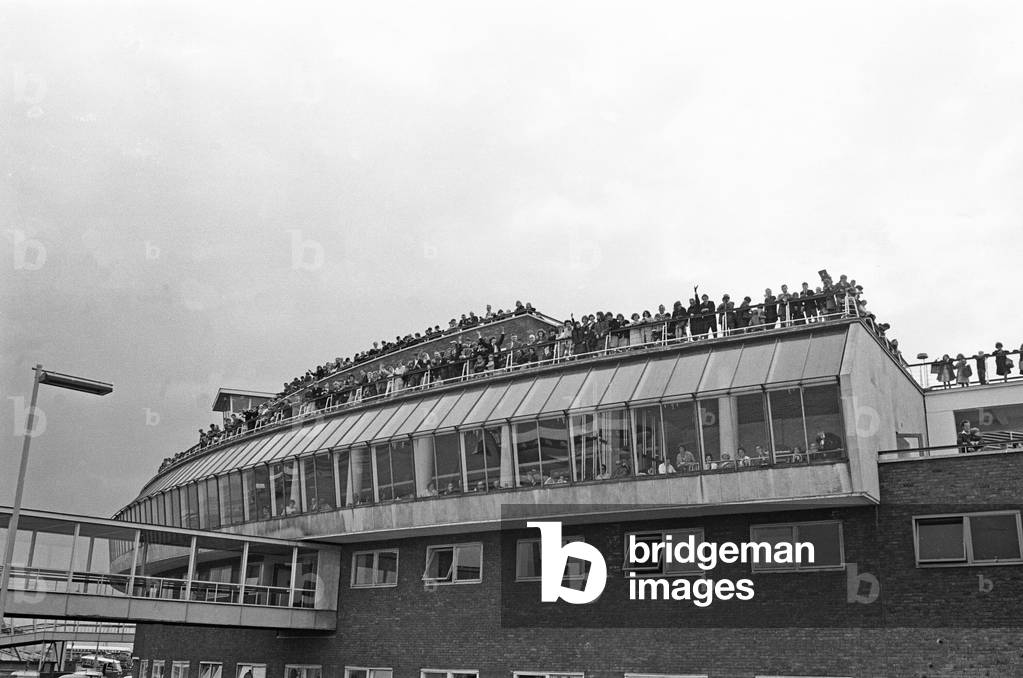The Beatles in Liverpool for the Premier of a Hard Day's Night. Photograph of the crowds gathering to catch a glimpse of The Beatles, John Lennon, Ringo Starr, George Harrison and Paul McCartney. 10th July 1964.