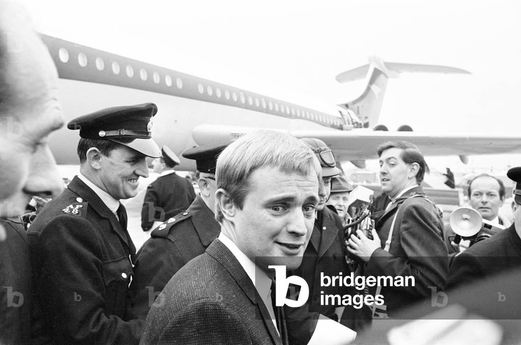 David McCallum, actor who plays the role of secret agent Illya Kuryakin in NBC show The Man from U.N.C.L.E., pictured arriving at London Heathrow Airport, 16th March 1966 (b/w photo)