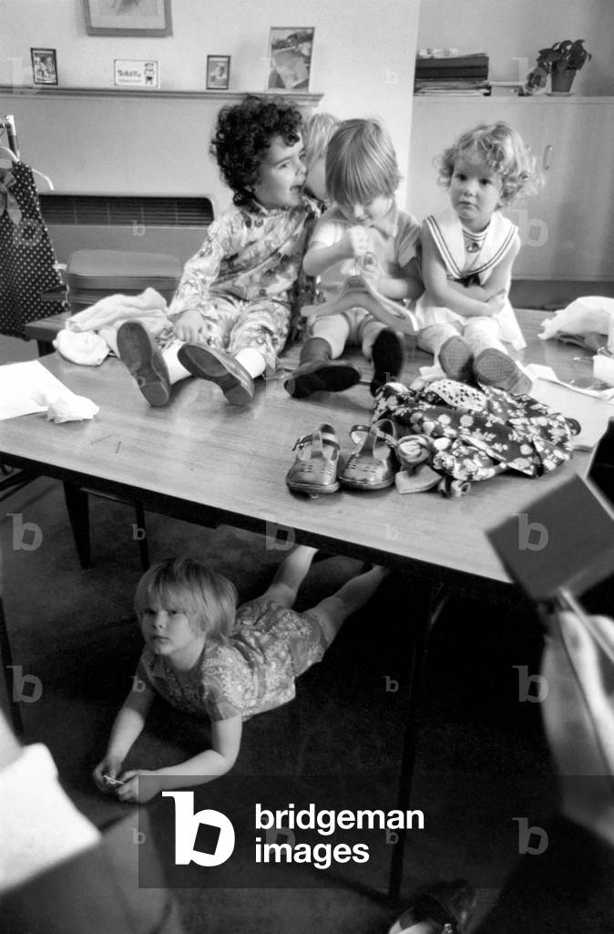 Away from the the crowd, this child model hides under the table
It's a pretty spring for children at Tick-A-Tee with a collection of super swinging co-ordinates, dresses and separate, shown in Conduit Street, by 