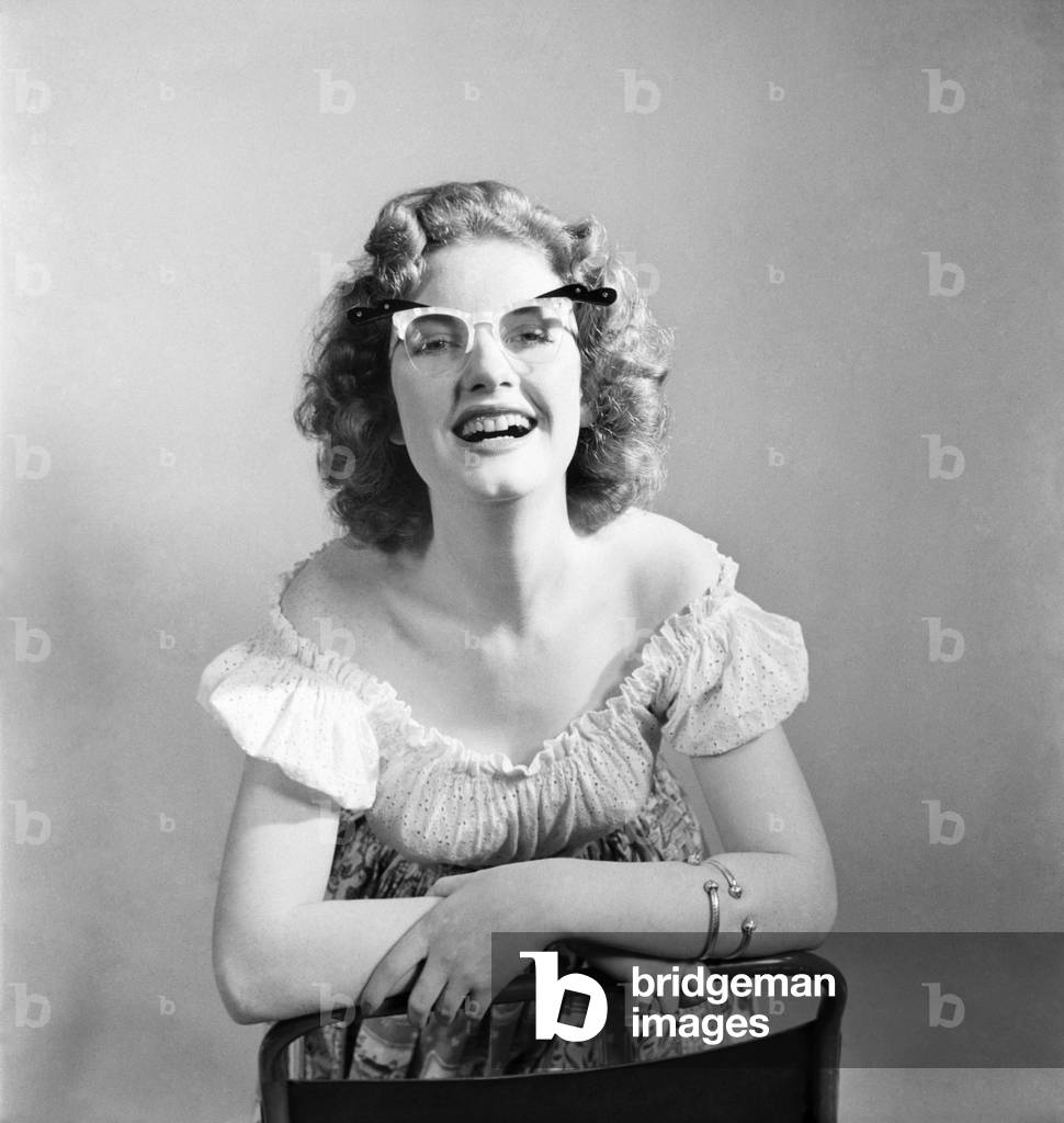 18 Yrs old actress Shirley Lorimer displaying the spectacles. May 1953 D2541-001