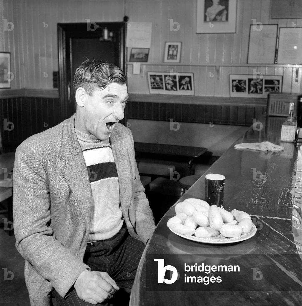 Sausage eating champion: Joe Steele of Bedlington Northumberland champion raw sausage eating champion. Circa 1965.