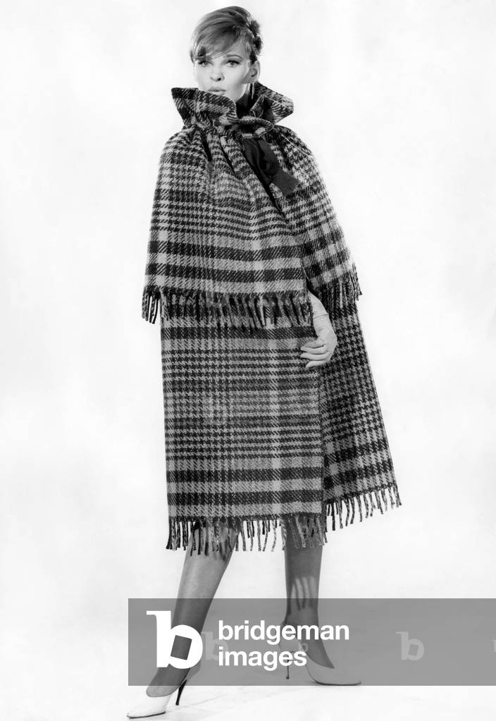 Model Dawn Chapman wearing tartan patterned outfit. Ocotober 1962