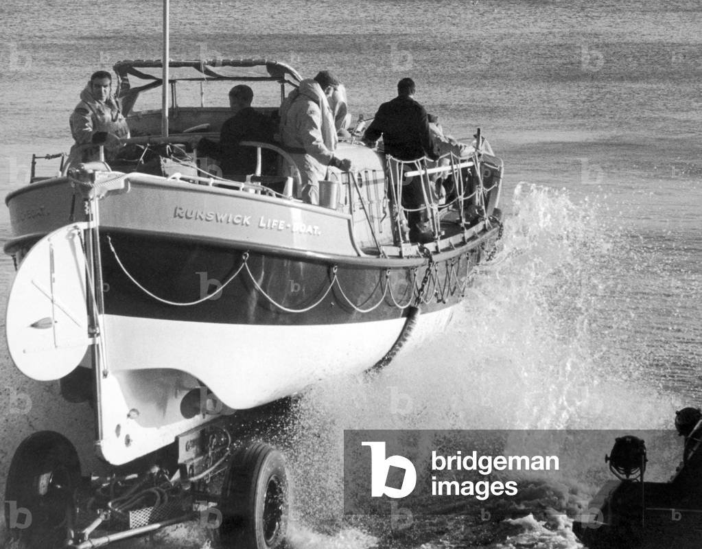 The new lifeboat at Runswick, the Royal Thames going for a practice run. It had two extra passengers on board, Ian Merryweather and Richard Cole, two boys who are taking the Duke of Edinburgh's award examination, through the Runswick Lifeboat station. 7th December 1970 (b/w photo)