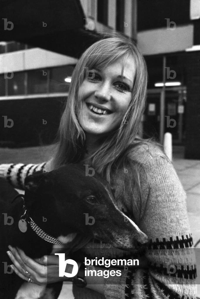 People with animals. Woman. Fiena Ward with her dog Barnabas outside Manchester College of Art. November 1969