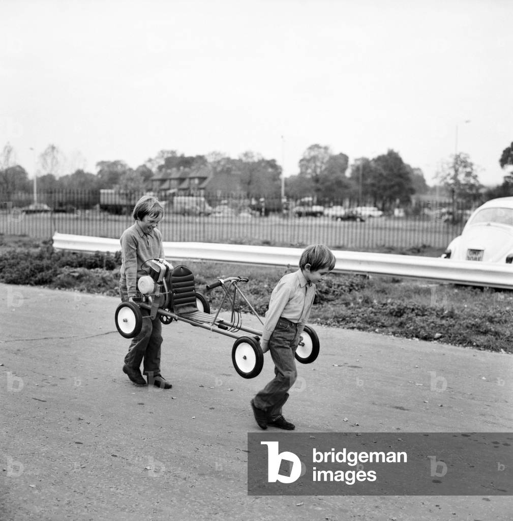 Children's Go-kart: Robert and Richard Spicer carry the Go Kart on to the Skid Pan. October 1972