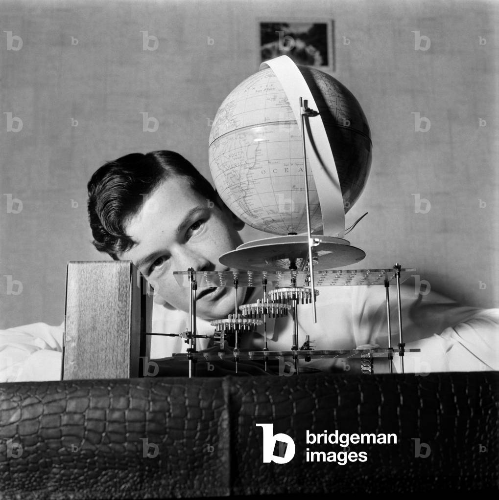 Youth. Teenager. Inventions. 16-year-old Geoffrey Jones with the revolving globe clock which he has made and patented. The clock tells the time in any part of the world simultaneously. November 1969