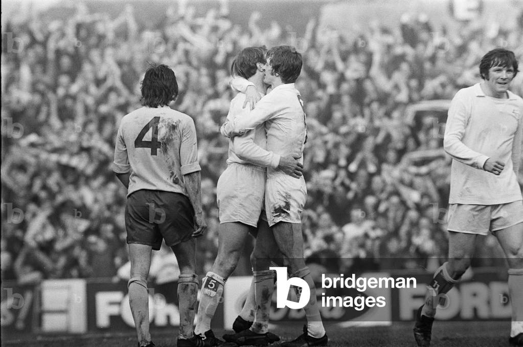 FA Cup Quarter Final match at Elland Road. Leeds United 2 v Tottenham Hotspur 1 Leeds' Jack Charlton celebrates a goal with teammate Allan Clarke, 18th March 1972 (b/w photo)