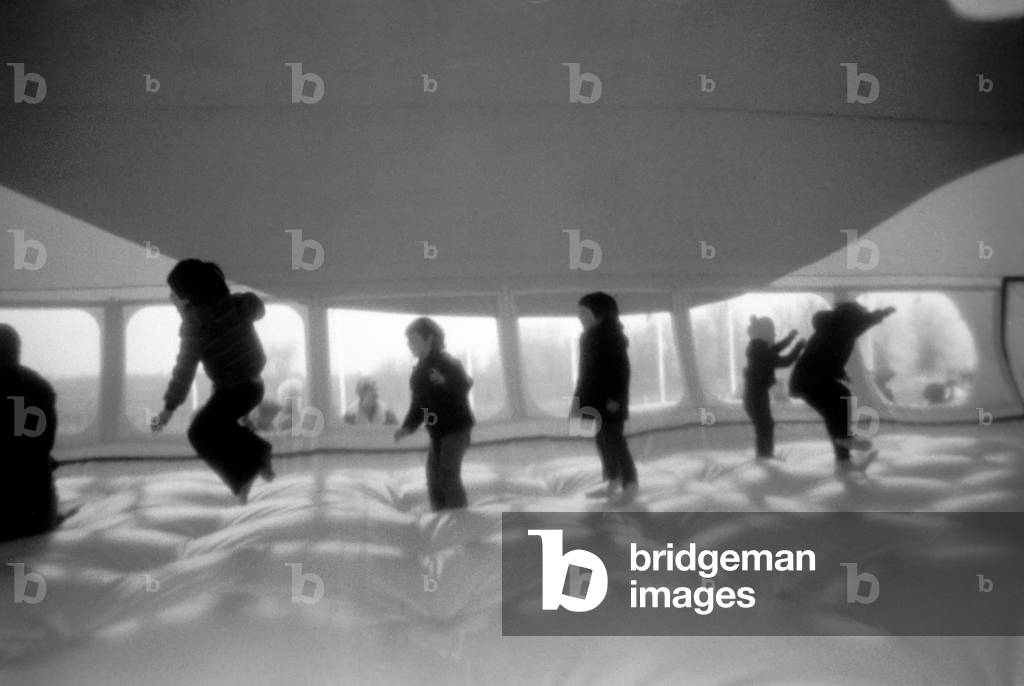 100 Foot Balloon: Children leap about inside the Whale Balloon, February 1975