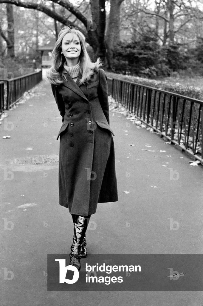 Fashion Clothing. Woman Model: Blanche Webb wearing the 'midi' coat. November 1969
