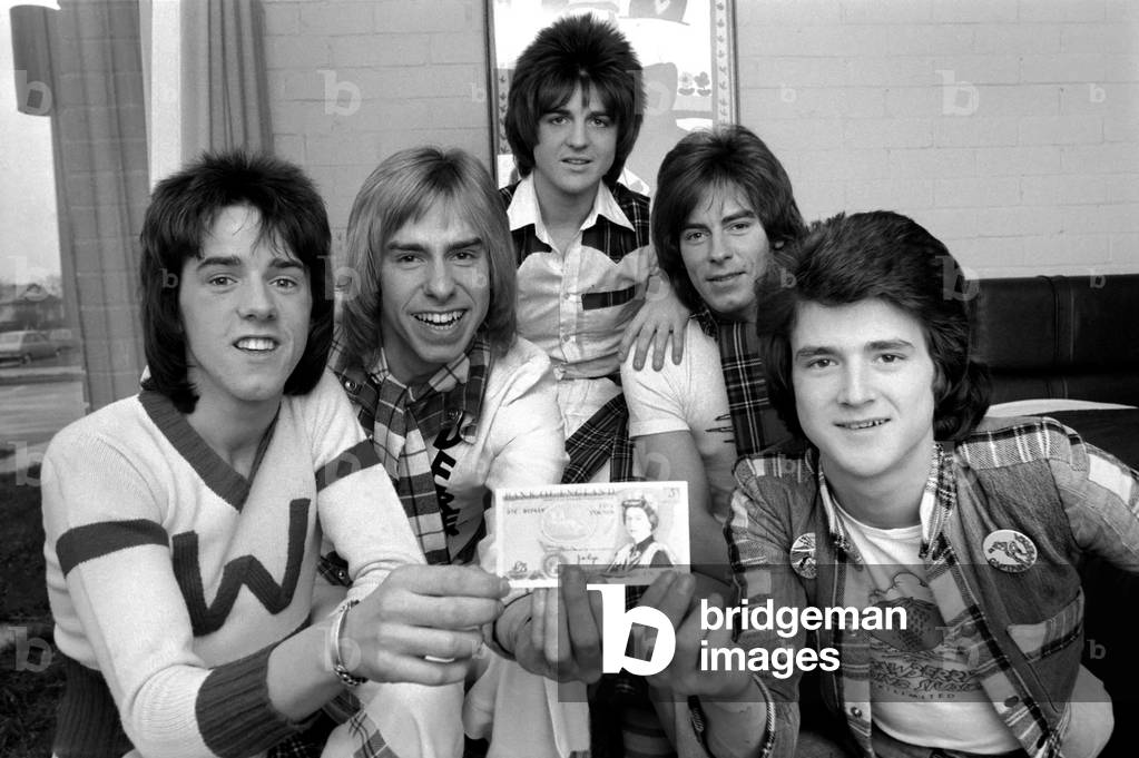 Bay City Rollers with the only cash between the Five of them - a Fiver!, 13th March 1975 (b/w photo)
