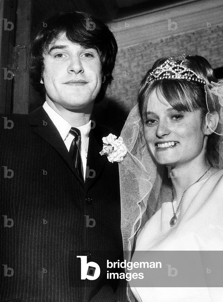 Ray Davis of The Kinks with his bride Rasa after their wedding
December 1964.