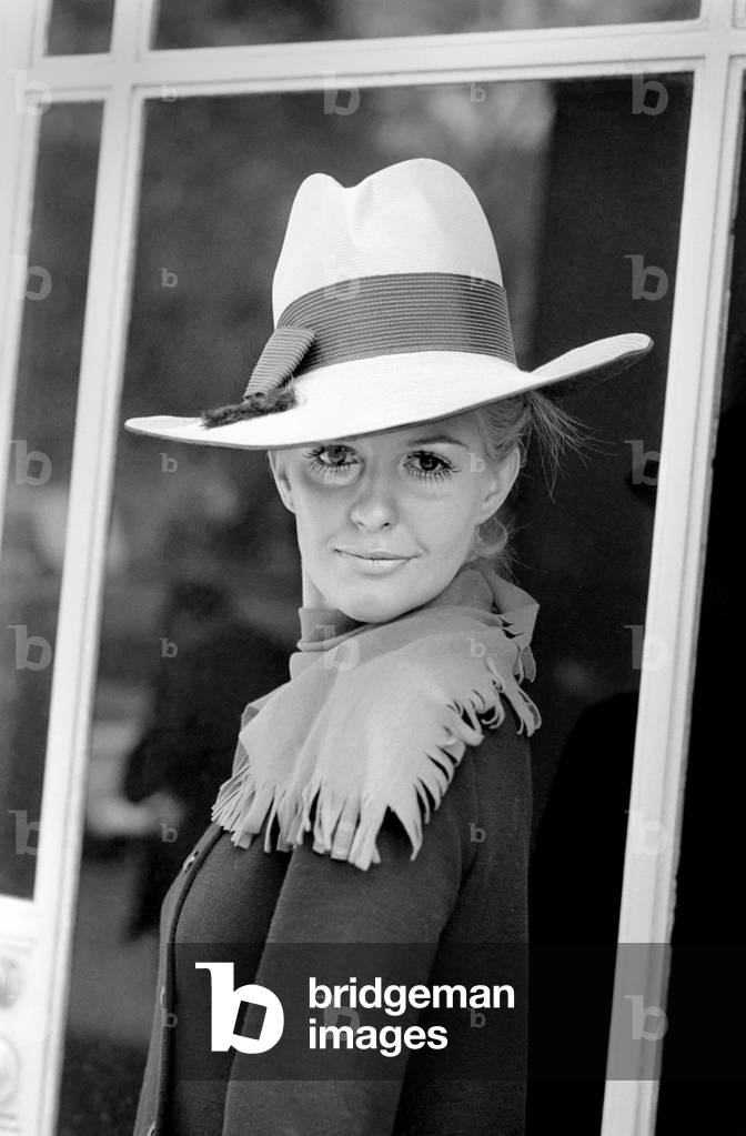 The Millinery Guild showed their Spring Collection of hats at the Dorchester, London. Jane Whiteley in a hat from Panda which he introduces as his Golden West, 