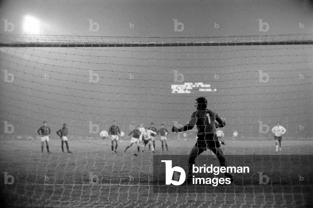 England's v. Portugal. Penalty! French referee Mouton wards off angry Portugese protests. January 1970 (photo)