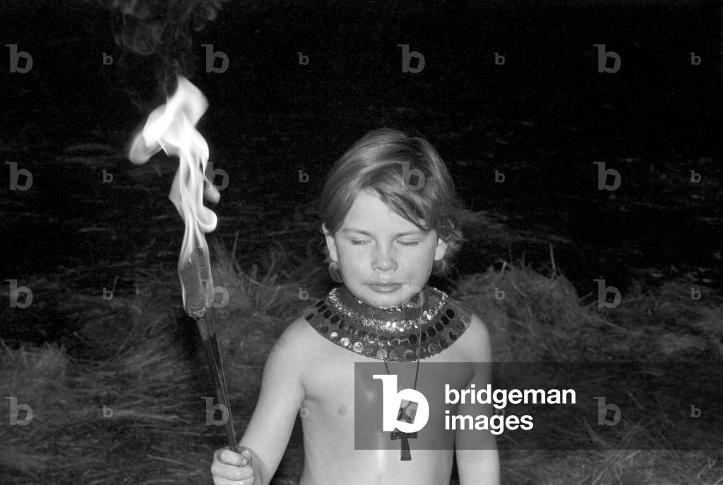 9 year old fire eater Tony Walls, December 1976 (b/w photo)